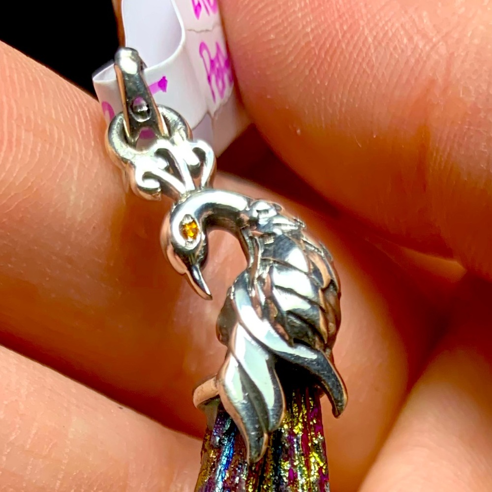 Solid sterling rainbow kyanite peacock pendant